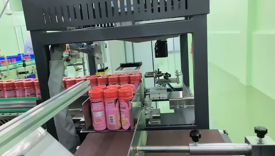 Sleeved seasoning salt bottles grouped at the downstream packaging section